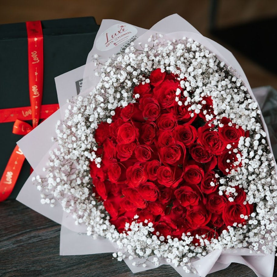 Rosy Reds – 100 Red Roses