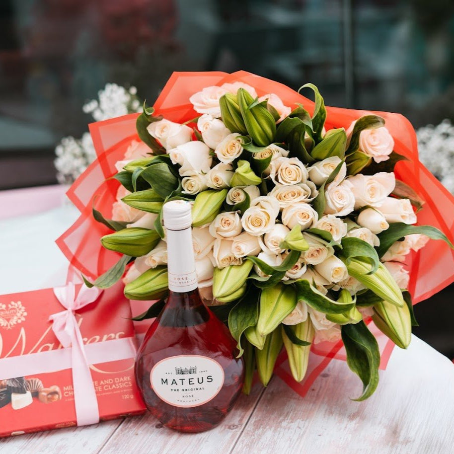 Sweet Haven – White Roses, Lilies, Chocolates & Wine